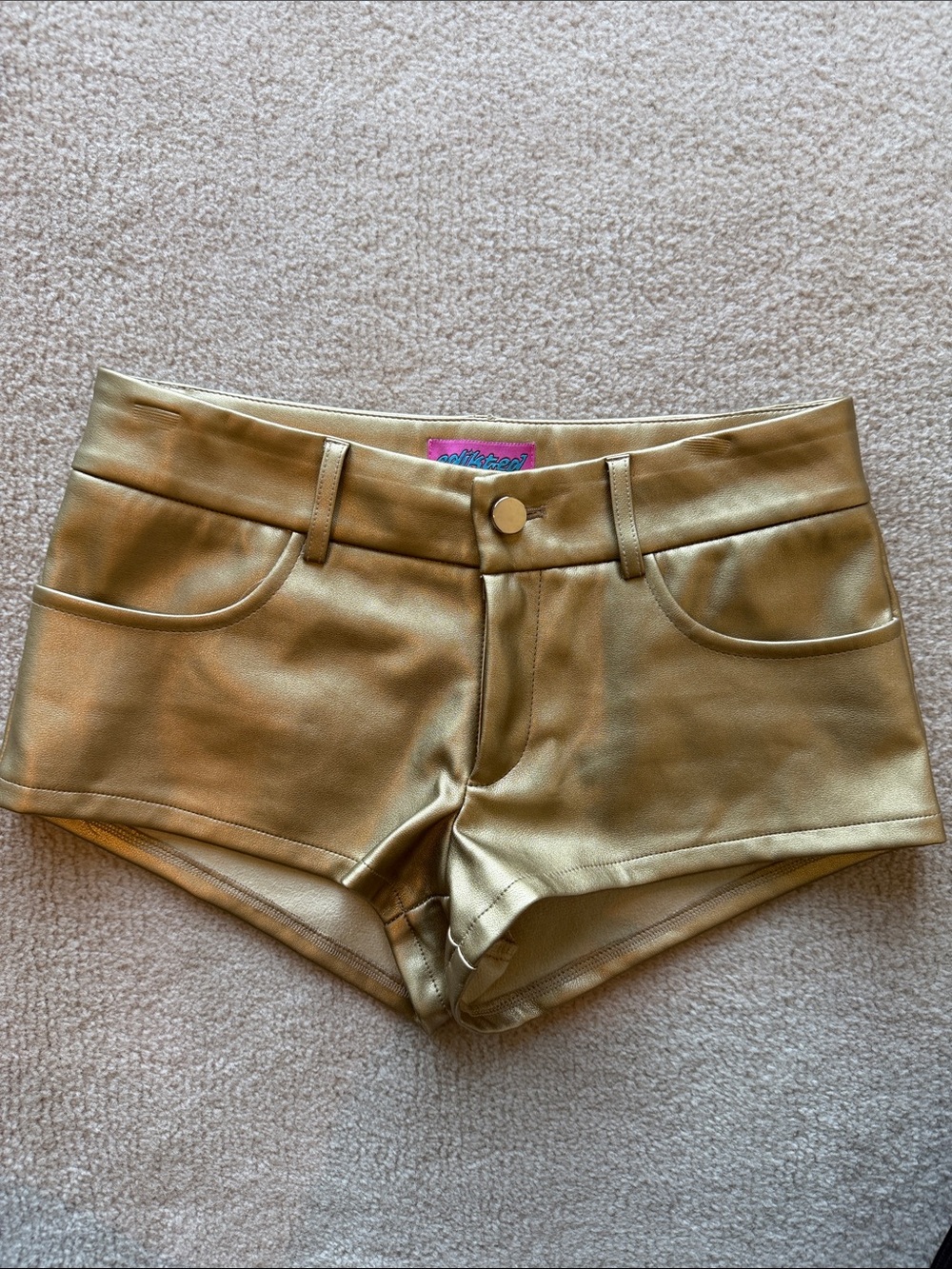 Edikted Metallic Gold Low-Rise Vegan Leather Shorts
